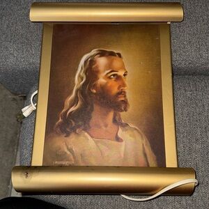 Head of Jesus by Warner Sallman in lighted metal frame